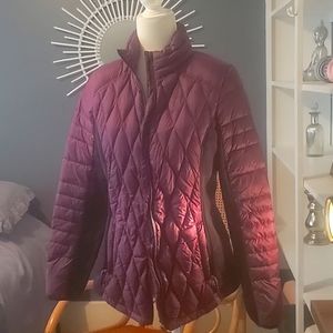 A good looking purple and black athletic jacket